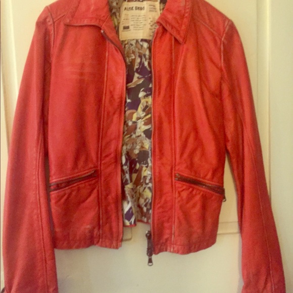 Distressed red leather jacket.